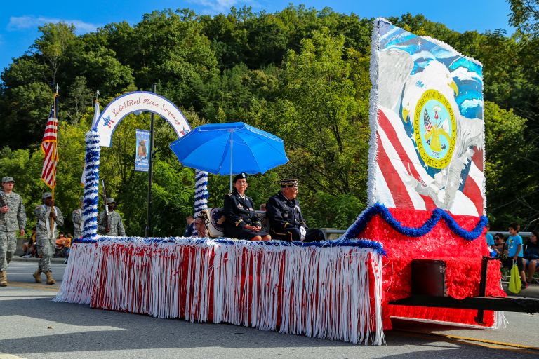 Image of a parade honoring lt. col. kina swayney