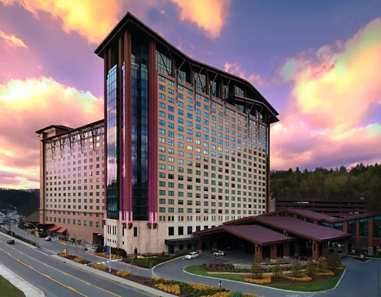 harrahs resort exterior view against sunset