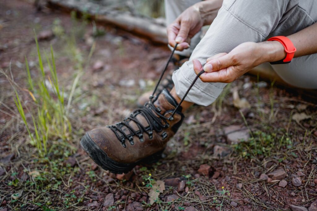 lacing up hiking boots